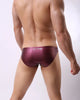 Slip hombre de piel efecto mojado con bolsa frontal